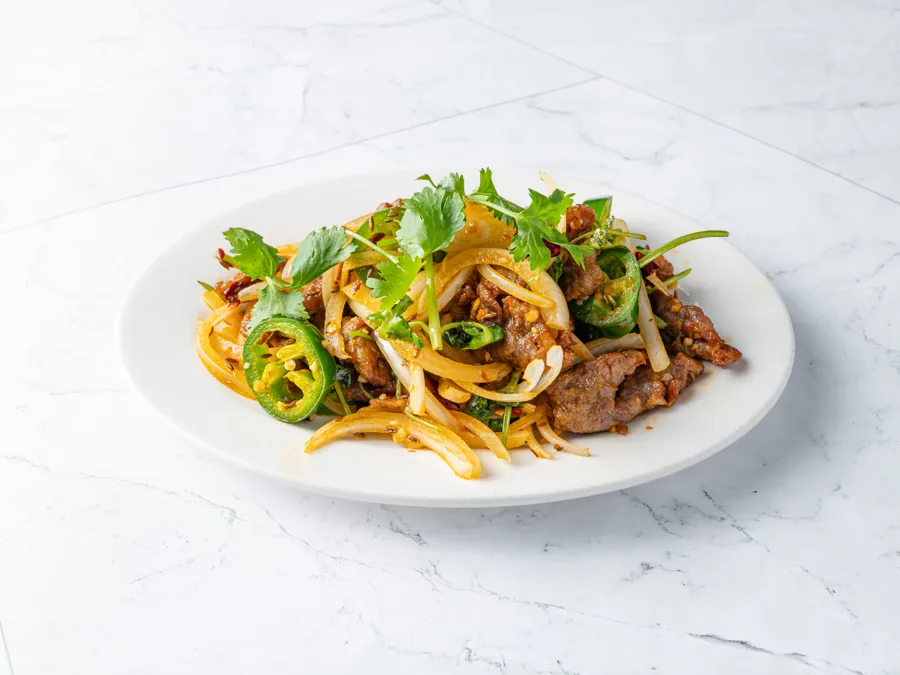 Cumin beef with onions, jalapeño, cilantro and chili flakes