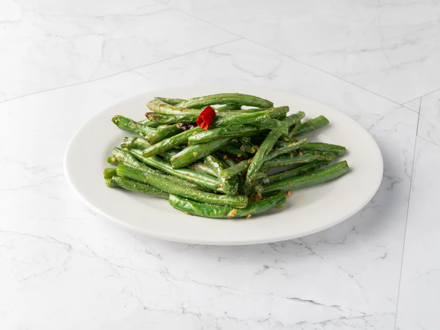 Hot braised green beans with a dried red chili