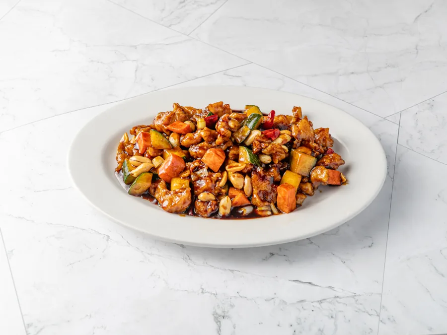 Kung Pao chicken with peanuts, dried chilies, zucchini and carrot