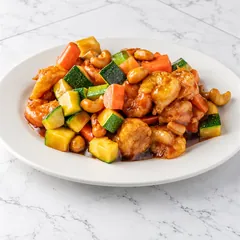 Cashew shrimp with zucchini and carrot in brown sauce