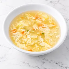 Egg flower soup with carrot and peas