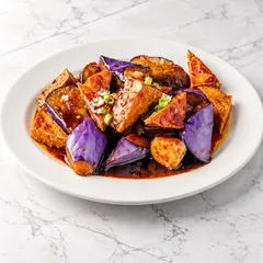 Eggplant and fried tofu in spicy garlic sauce with green onion