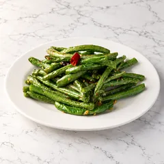 Hot braised green beans with a dried red chili