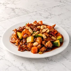 Kung Pao combination with shrimp, beef, chicken, peanuts, zucchini and carrot