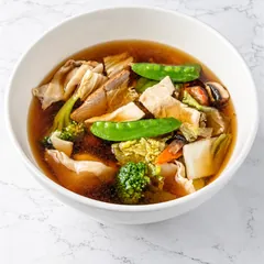 Wor wonton soup with wontons, barbecue pork, chicken, broccoli, snow peas and cabbage